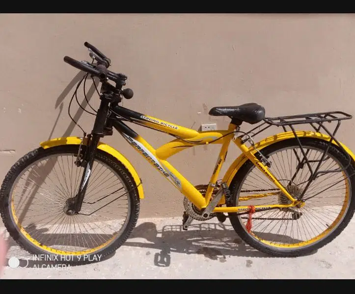 Yellow colour gear mountain bicycle for sale is available in Islamabad