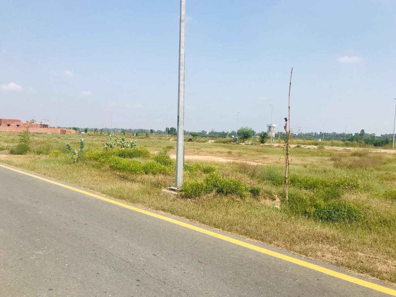 Prime Commercial Plot with Essential Amenities in DHA Phase 8 – Block T | Invest Now!