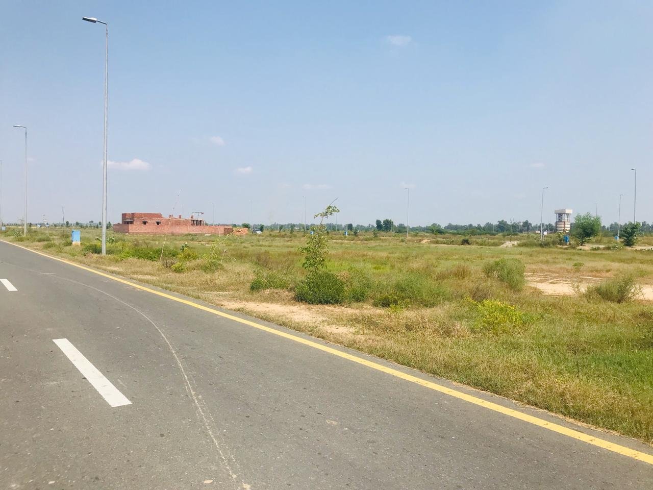 Stunning Location 9 Marla Residential Plot for sale in dha phase 4 – Block KK